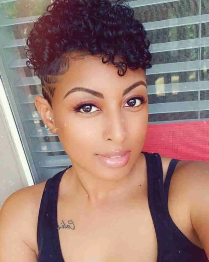 short and curly hair african american woman