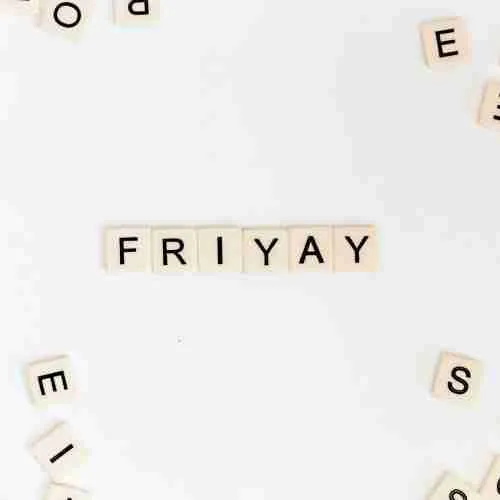 Friyay scrabble pieces on white surface